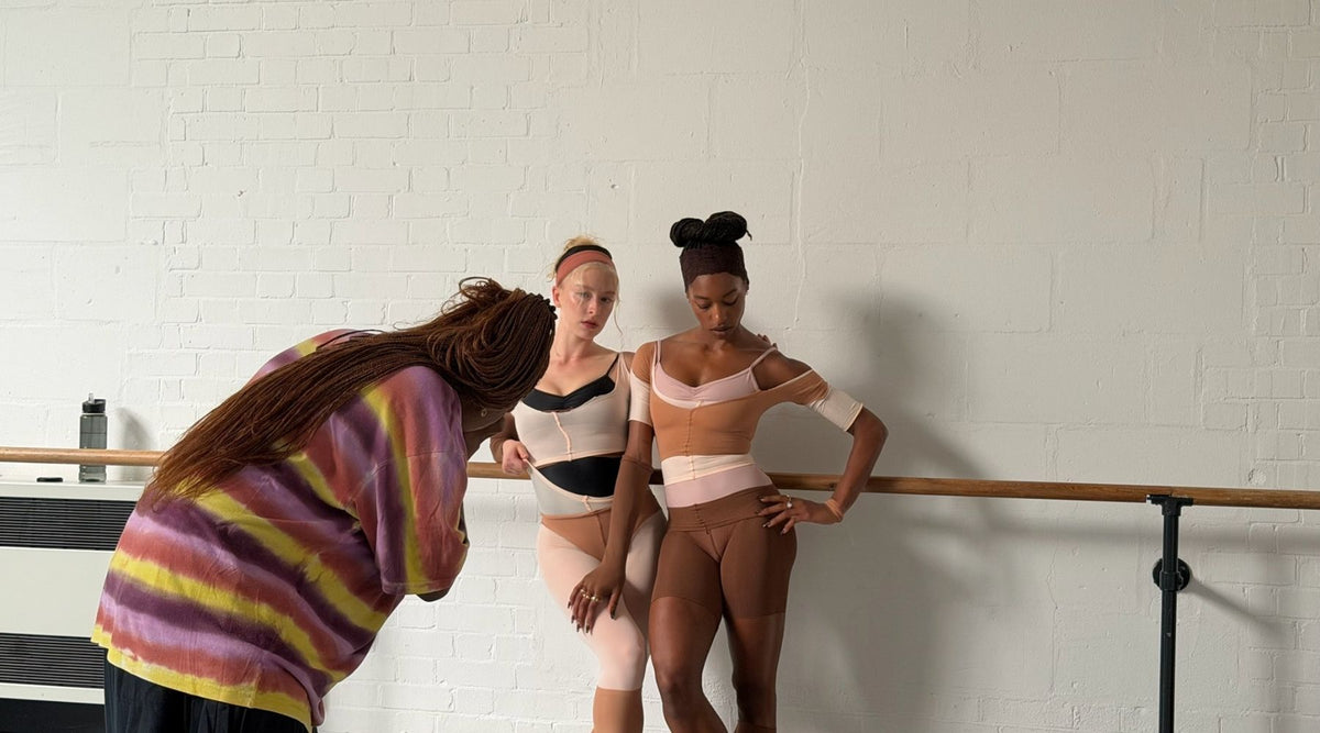 Danika Magdelena photographs Jacey Gailliard and another dancer beside a ballet barre in a London studio