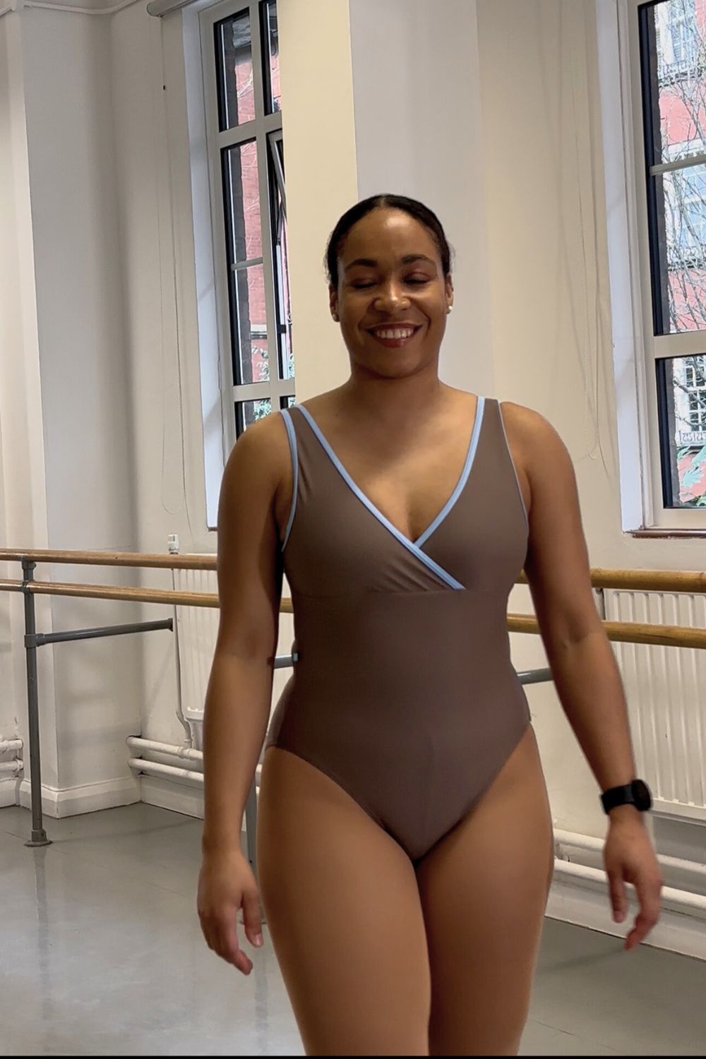 adult community ballet dancer wearing Imperfect Pointes Marseille ballet leotard in Mocha brown in the ballet studio