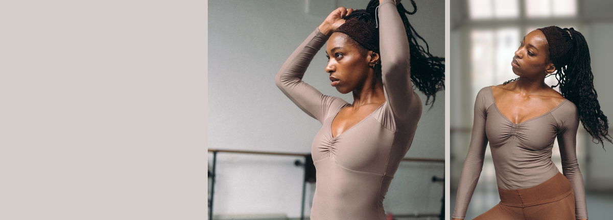 A ballerina in a dance studio wearing the Women's Alexandria Long Sleeve Leotard in Mocha, with its ruched sweetheart neckline, shown in two poses