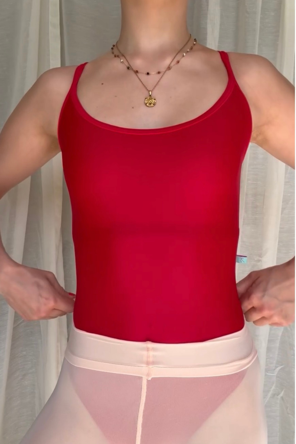 red strappy leotard